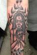 Black and grey witch and dolls head tattoo